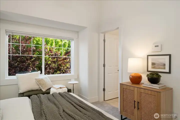 Wake up to stunning Mt. Rainier views (in Winter) from the comfort of the spacious primary suite, complete with an en suite bath.