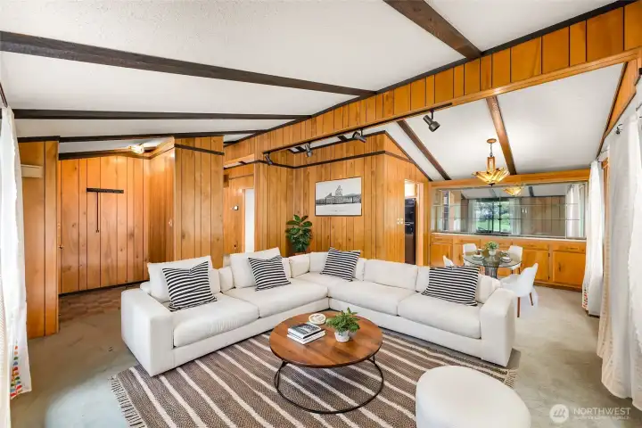 Virtually staged living and dining area. Virtually staged living and dining area.