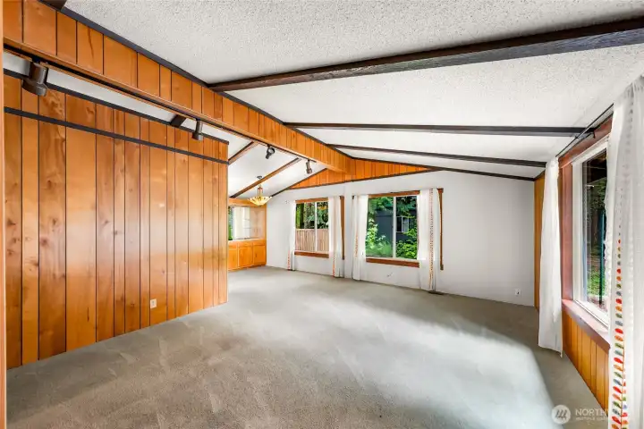 Open beam vaulted ceilings create a bright and welcoming living space. Open beam vaulted ceilings create a bright and welcoming living space.