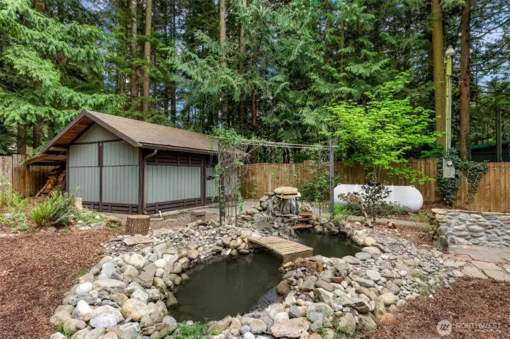 Multiple outdoor gathering spaces designed for relaxing and entertaining in the backyard. The sound of the waterfall is so relaxing! Multiple outdoor gathering spaces designed for relaxing and entertaining in the backyard. The sound of the waterfall is so relaxing!