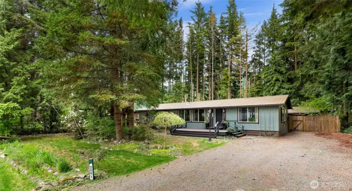 Ample parking with room for RV setup and recreational gear. 30 amp hookup by fence. Ample parking with room for RV setup and recreational gear. 30 amp hookup by fence.