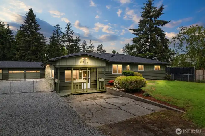 This beautifully maintained 2,096 sq ft Mid-Century rambler on 1.38 acres features 4 bedrooms, 1.75 baths, two detached garages/shop spaces, RV parking, and expansive outdoor living.