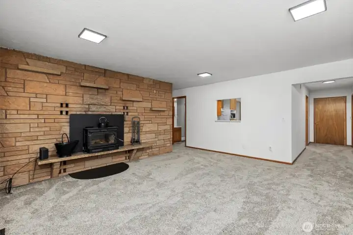 The fireplace surround is made from locally sourced Wilkeson sandstone as is the chimney.