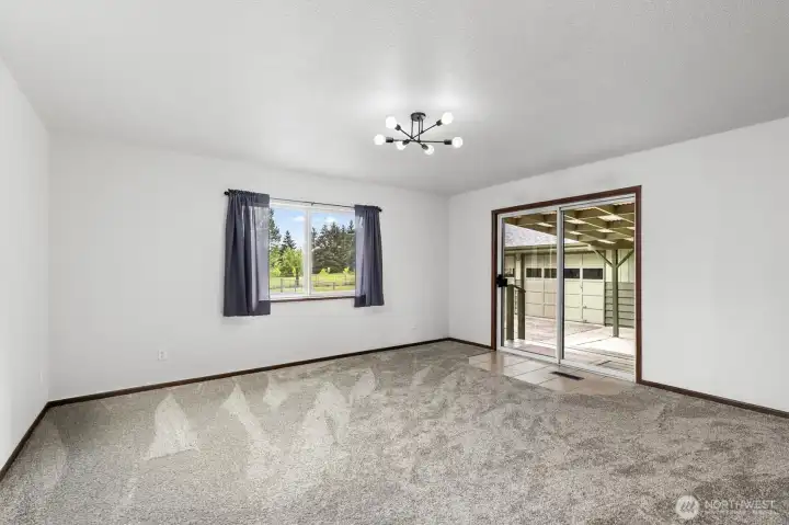 Rec room that leads to the backyard.