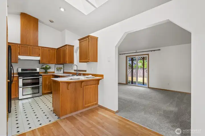 A slider off of the family room leads to the fenced in backyard.