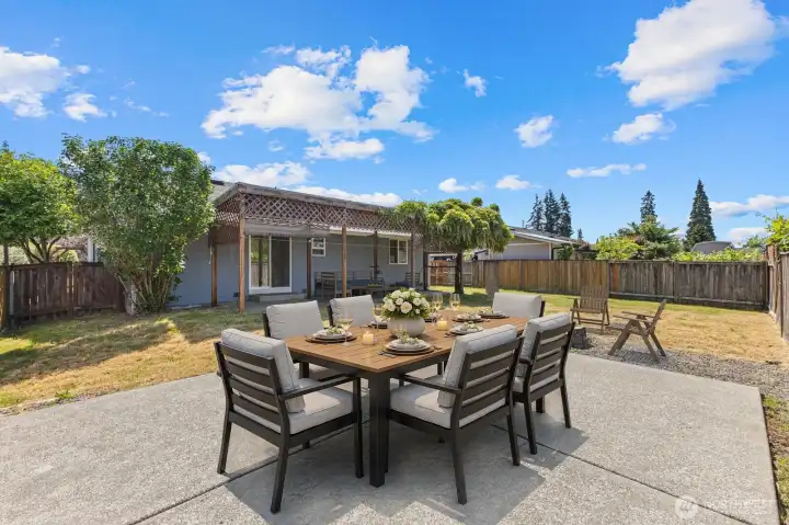 Nice large cement patio great for a sport court, outdoor dining area, covered gazebo, possibly build a shop etc..  Virtually staged.