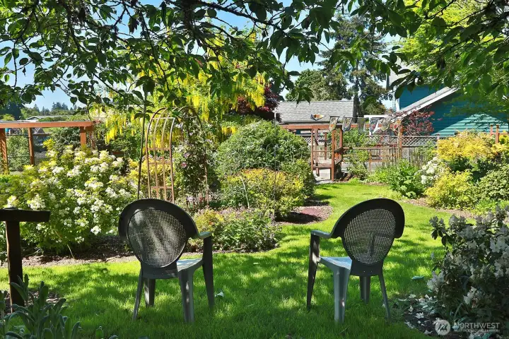Come and enJOY the beauty and peace of this magical Langley property.