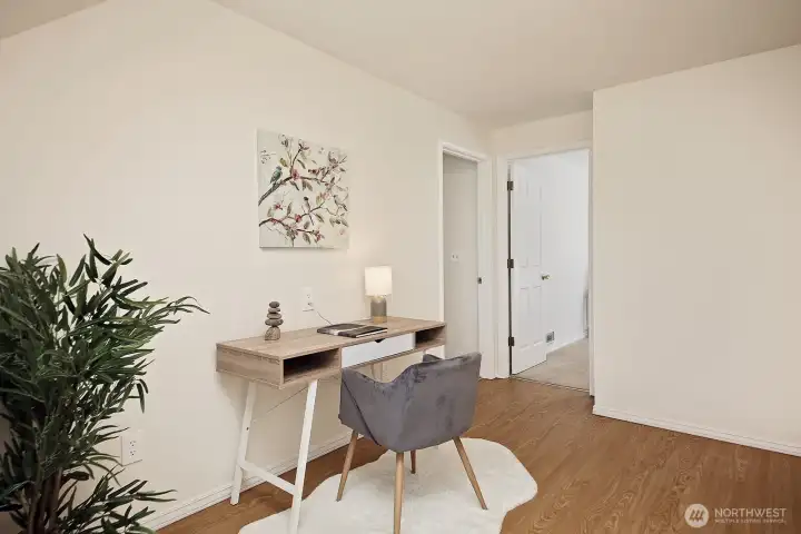 Bedroom #5 is straight ahead and the Primary Suite is the doorway to the left.