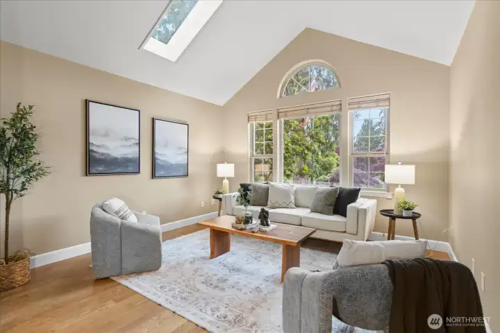 Vaulted ceilings and skylights fill the home with natural light.
