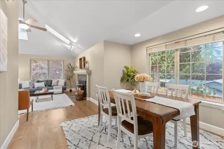 Formal dining room connects the living room with the family room.