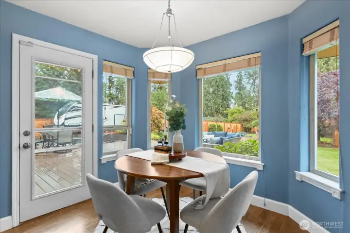 Enjoy meals with views of the private backyard retreat.