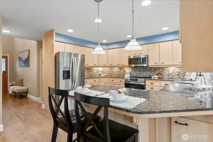 The heart of the home with easy access to indoor and outdoor entertaining spaces.