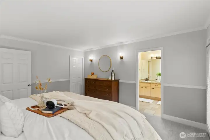 Desirable main-floor primary suite offers convenience and privacy.
