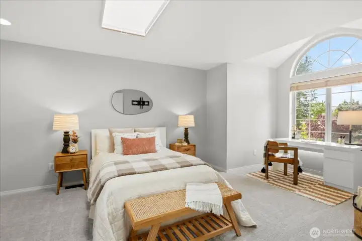 Generously sized bedroom with abundant natural light.