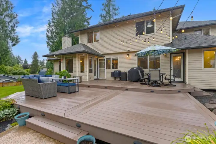 Expansive PVC deck creates the perfect setting for outdoor dining and entertaining.
