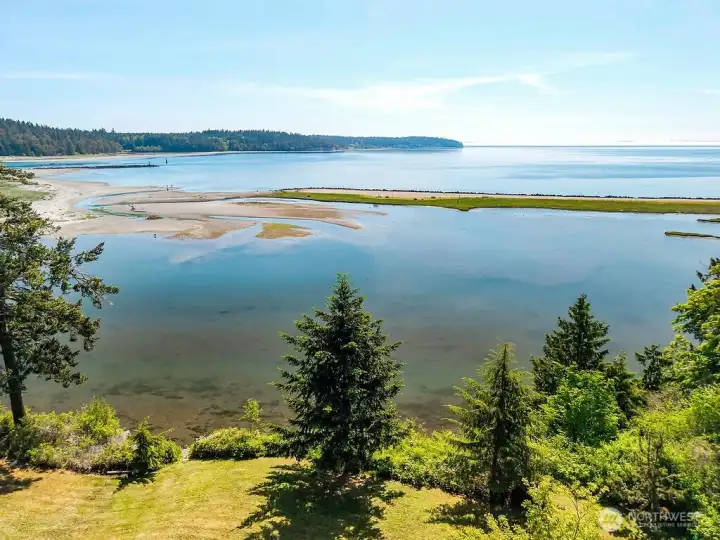 A drone view over the 4.72 acres with Oak Bay County park spit in the middle and Marrowstone Island in the background.