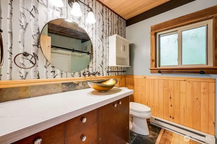 The 3/4 hallway bath has many updates and a newer large shower. The whole house has been recently re-wired and re-plumbed.