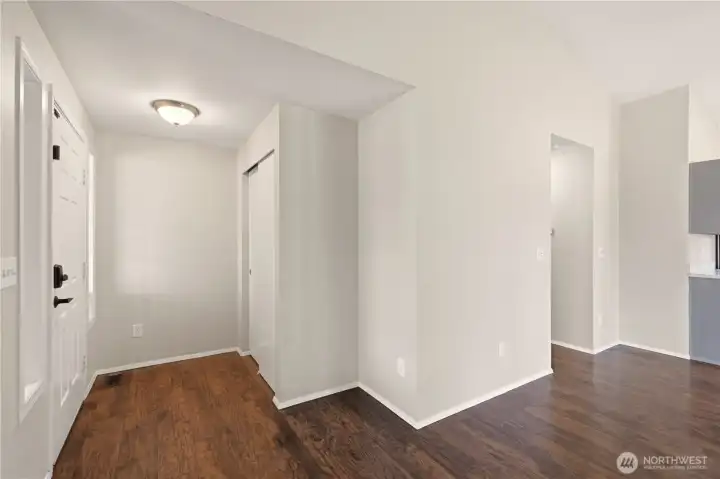 Entry way and view of hallway from living room