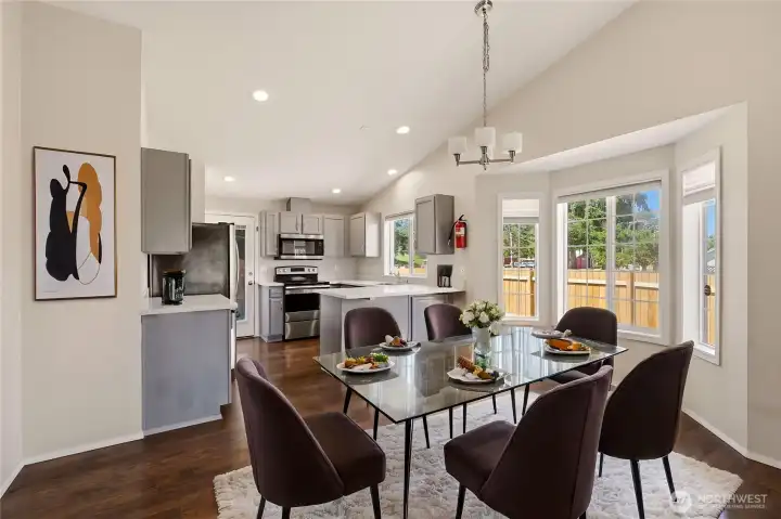 Virtually staged dining area off of Kitchen
