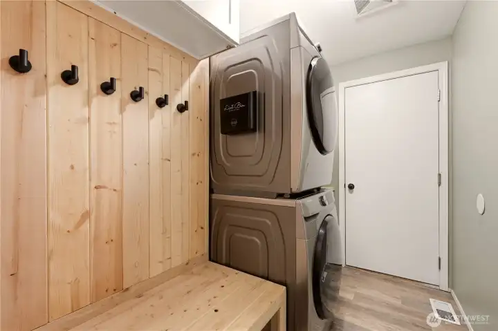 Utility Room off of hallway w/access to garage, perfect for hanging your jackets, taking the shoes off and calling it a day!