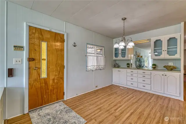 Welcome Entry to open dining room with built-in's and adjoins to cheerful kitchen + large living room