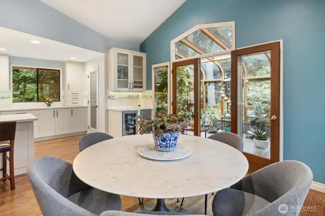 Formal dining, beverage bar, and solarium entry!