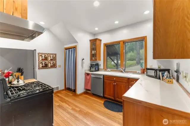 Ample counter space and natural light—perfect for prepping garden-fresh meals with a view