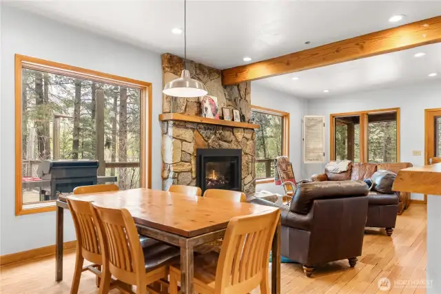 Great room with center stone fireplace