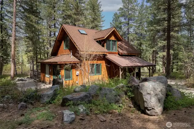 43.8-acres with licensed nightly rental cabin, fenced meadow, barns, water rights, direct trail access, Conservation Easement with two building sites, and sweeping Methow Valley views—an unparalleled mix of income, recreation, and homestead potential