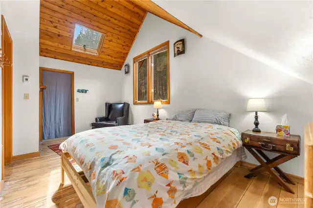 Vaulted wood ceilings and soft natural light create a peaceful retreat—your own quiet corner of the mountains