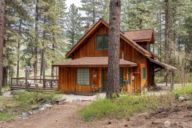 Charming farmhouse, nightly rental cabin nestled among the trees—licensed and income-producing