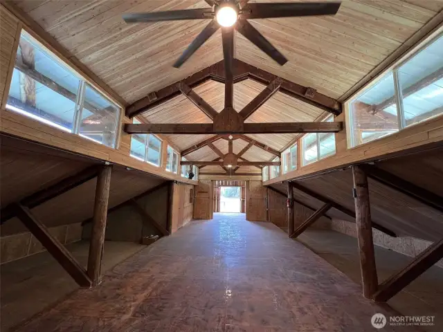 Soaring barn loft with exposed beams, clerestory light, and rugged charm—ready for your bunkhouse, art studio, or a cowboy’s hideaway