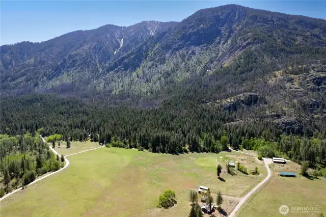 Commanding views of Virginia Ridge rise just beyond the back door—where wild land meets Country living