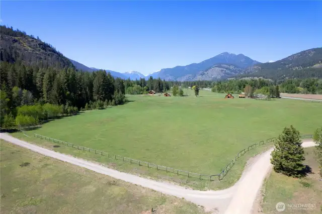Sweeping meadow views framed by Goat Peak and the North Cascades—your slice of rugged Methow Valley freedom