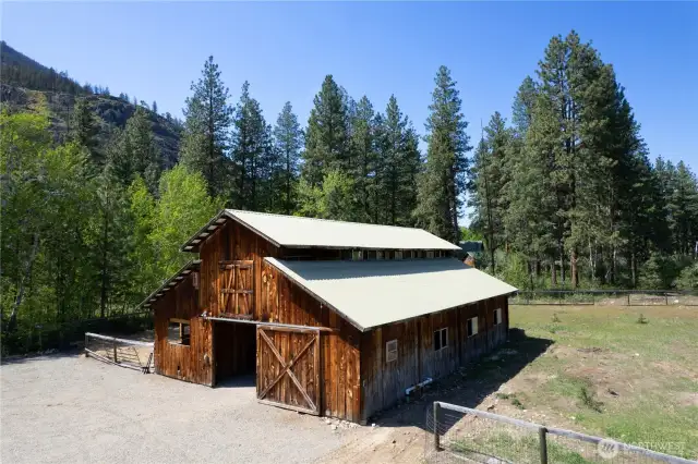 Main barn with recent loft remodel, clearstory windows, and bathroom-ready infrastructure—versatile for studio, office, or bunkhouse use