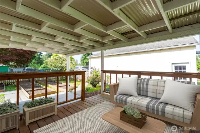 Enjoy the outdoors rain or shine on the covered deck.