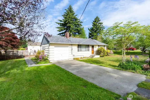 One car attached garage with ample driveway parking.