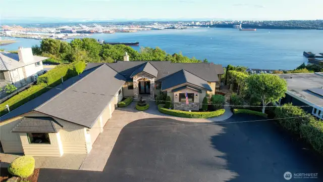 Welcoming guests in style, this home features ample parking and an elegant front entry that blends function with beauty.