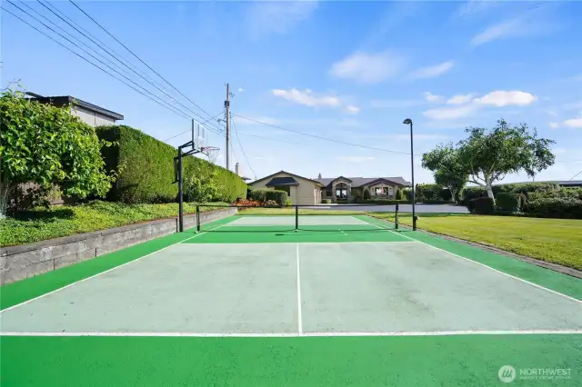 Lighted sports court allows for evening games and extended playtime—perfect for basketball, tennis, or pickleball under the stars.