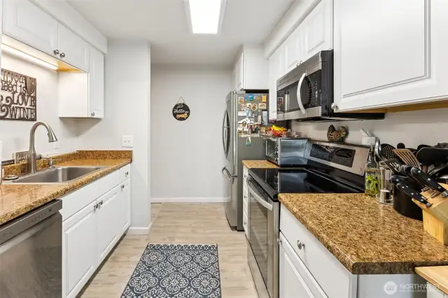All appliances stay including the high-tech fridge.