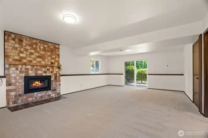 Lower level family room with fireplace.