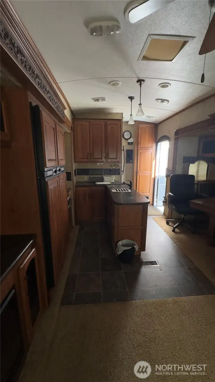 View of kitchen from living area