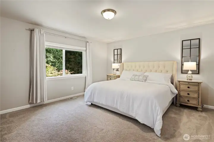 Spacious retreat + full ensuite bath.