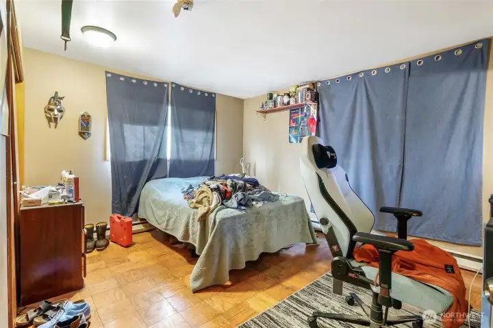 Secondary bedrooms ideal for guests, office, or hobby space