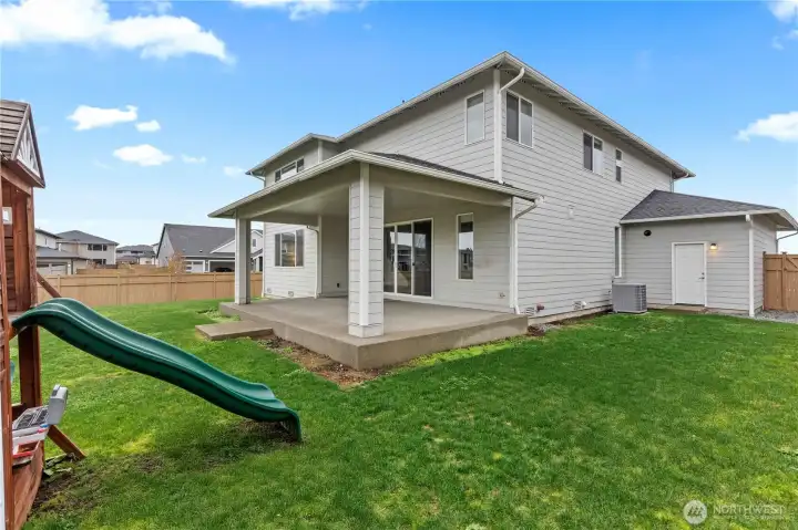 Home comes with A/C unit and convenient man door off the garage for easy backyard access.