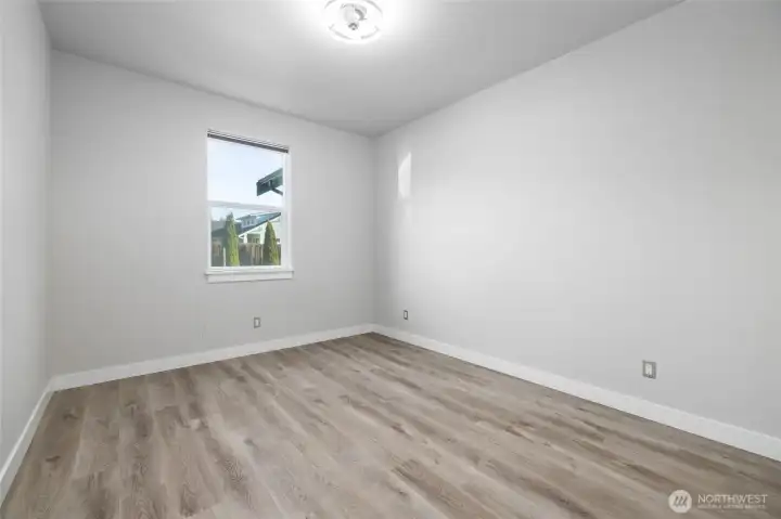 Main floor guest bedroom.