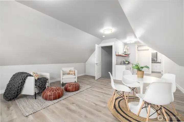 Bonus room above the garage, with wet bar area and bathroom visible on the right.