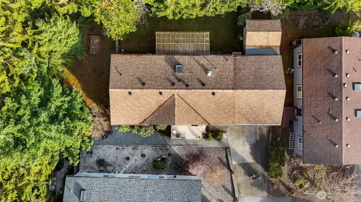 Brand new roof on house and shed in 2024.  See all the greenspace around 2 sides!