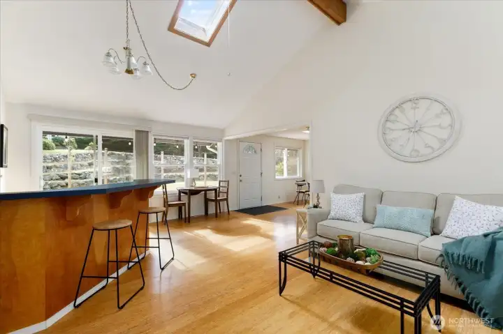 Loads of windows, thoughtfully placed skylights, and a warm bamboo floor, create the perfect balance of light.