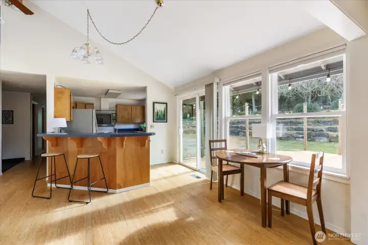 Eat-in kitchen w/breakfast bar allows for a front row seat to watch the cook in action!